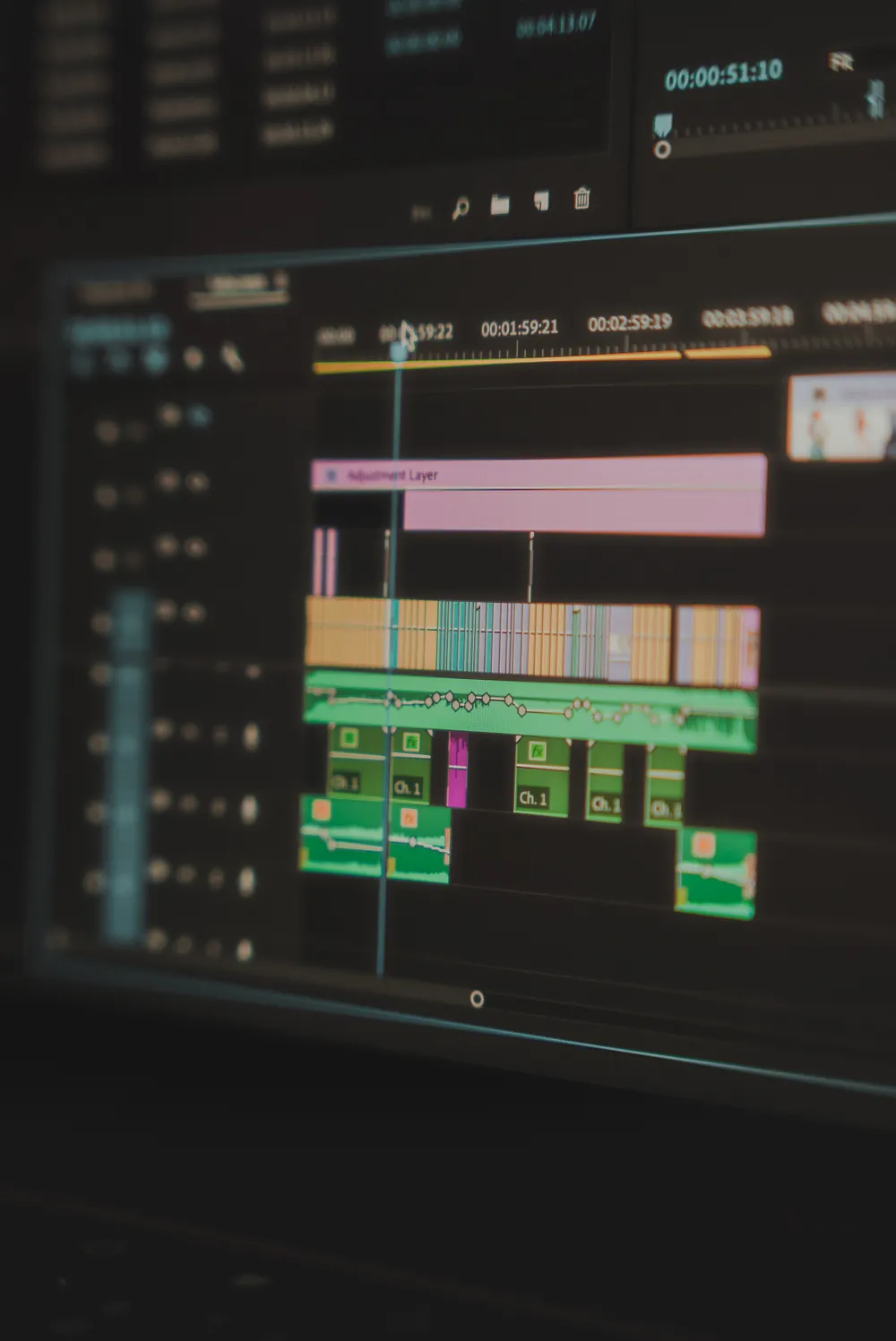 An editing timeline on a screen with clips laid out in sequence.